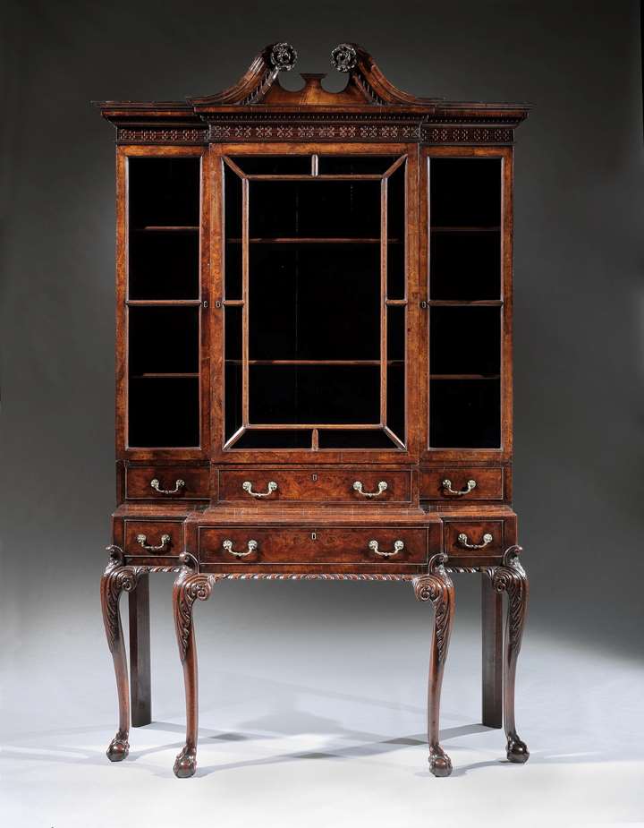 A rare George II Period walnut and burr walnut veneered breakfront cabinet on stand in the manner of Giles Grendey